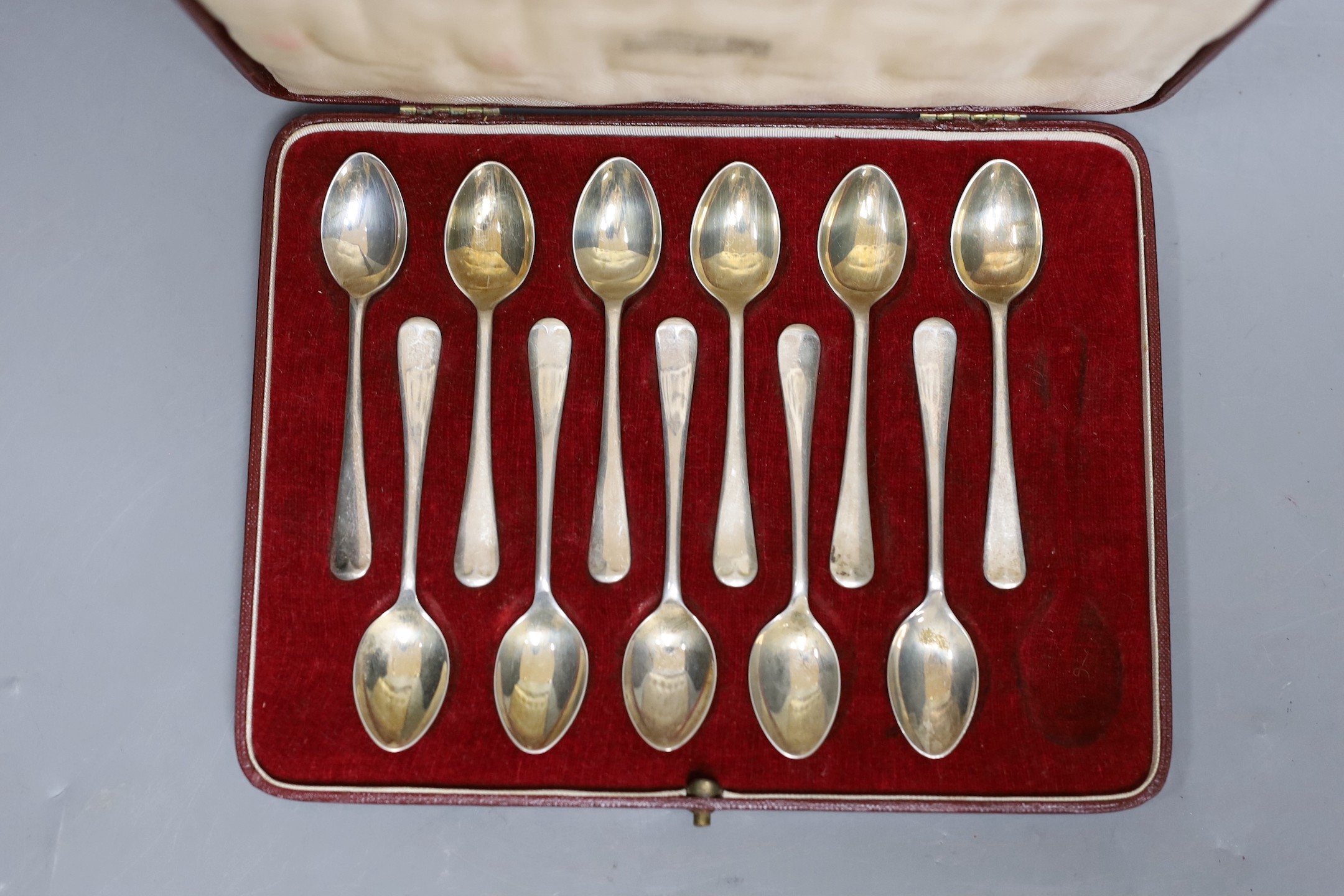 A cased set of eleven (of 12) George VI silver coffee spoons, Sheffield, 1950.
